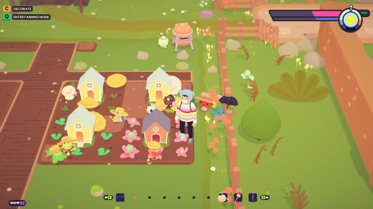 Un agricoltore Ooblet si trova accanto a più Oobcoops