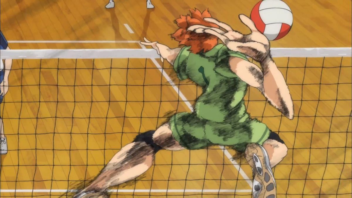Shoyo Hinata, il personaggio principale di Haikyu !! salta in aria per schiacciare una pallavolo