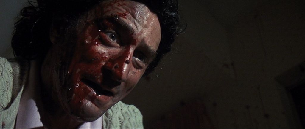Robert De Niro in Cape Fear con il volto insanguinato