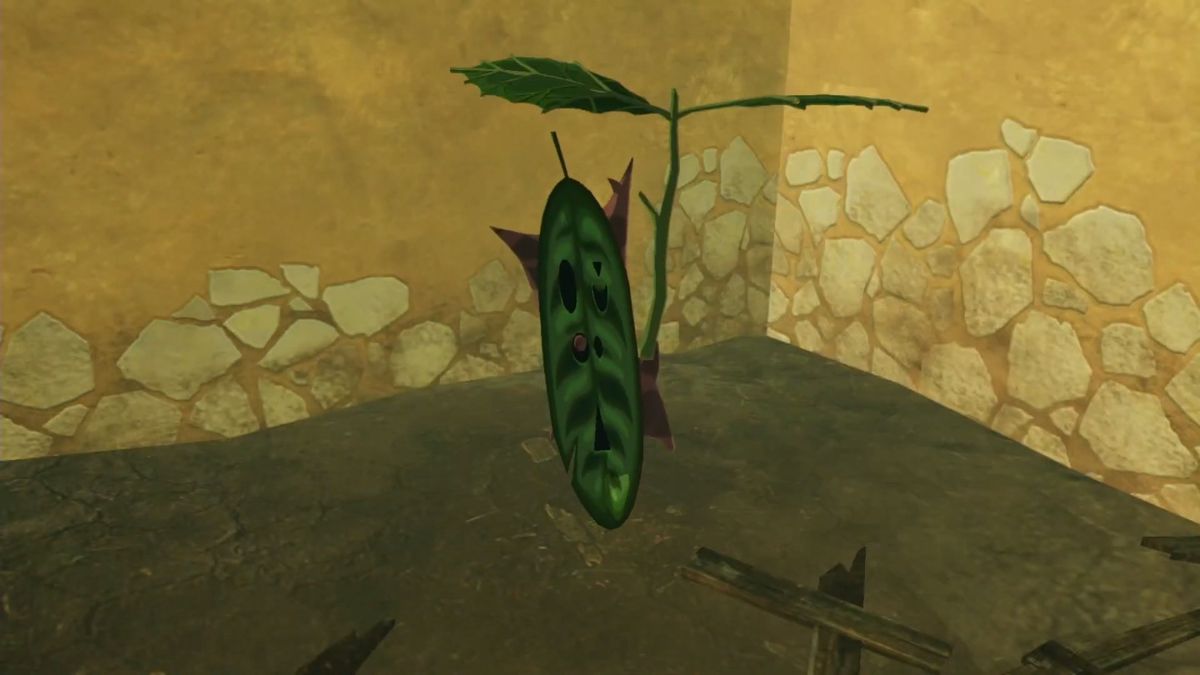Un Korok di Zelda si trova in un angolo con in mano un ombrello con le foglie