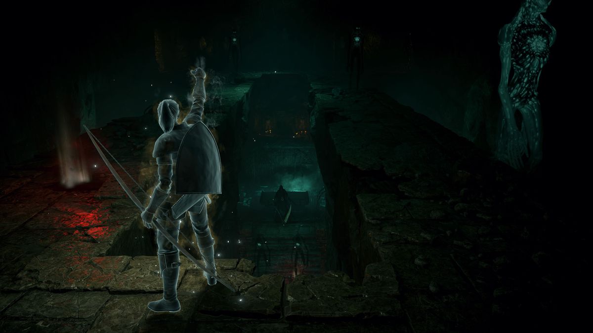 Un giocatore si trova di fronte a un mietitore in uno screenshot di Demon's Souls (PS5)