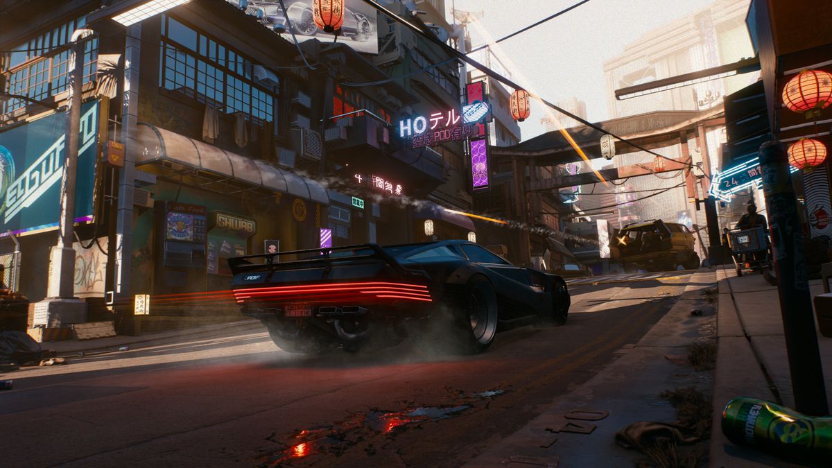 Cyberpunk 2077 - due ragazzi che sparano da un furgone a un'auto sportiva che li sta seguendo