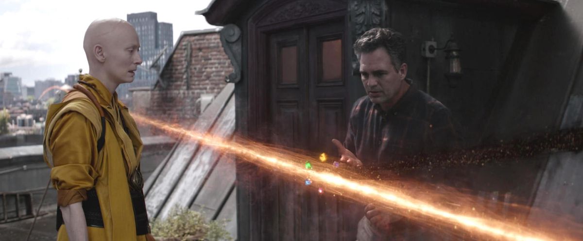 The bald Ancient One (Tilda Swinton) describes the flow of time and the Infinity Stones to Mark Ruffalo’s Bruce Banner in Avengers: Endgame
