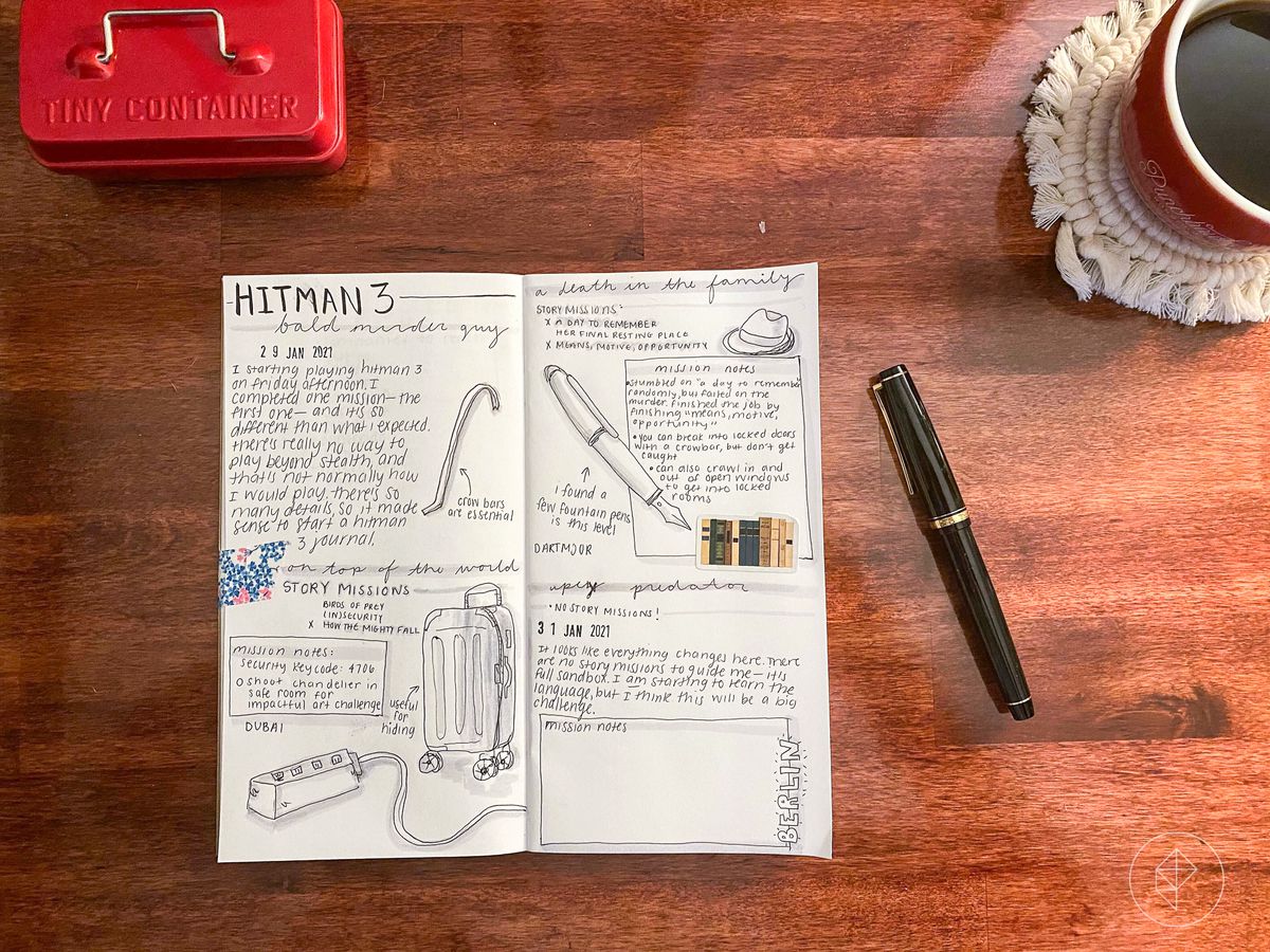 disposizione piatta di un giornale hitman 3 con una penna stilografica