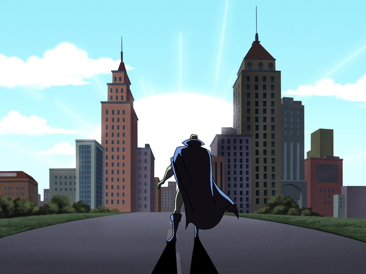 Un'esplosione di energia si scatena nel mezzo di una città mentre Martian Manhunter osserva