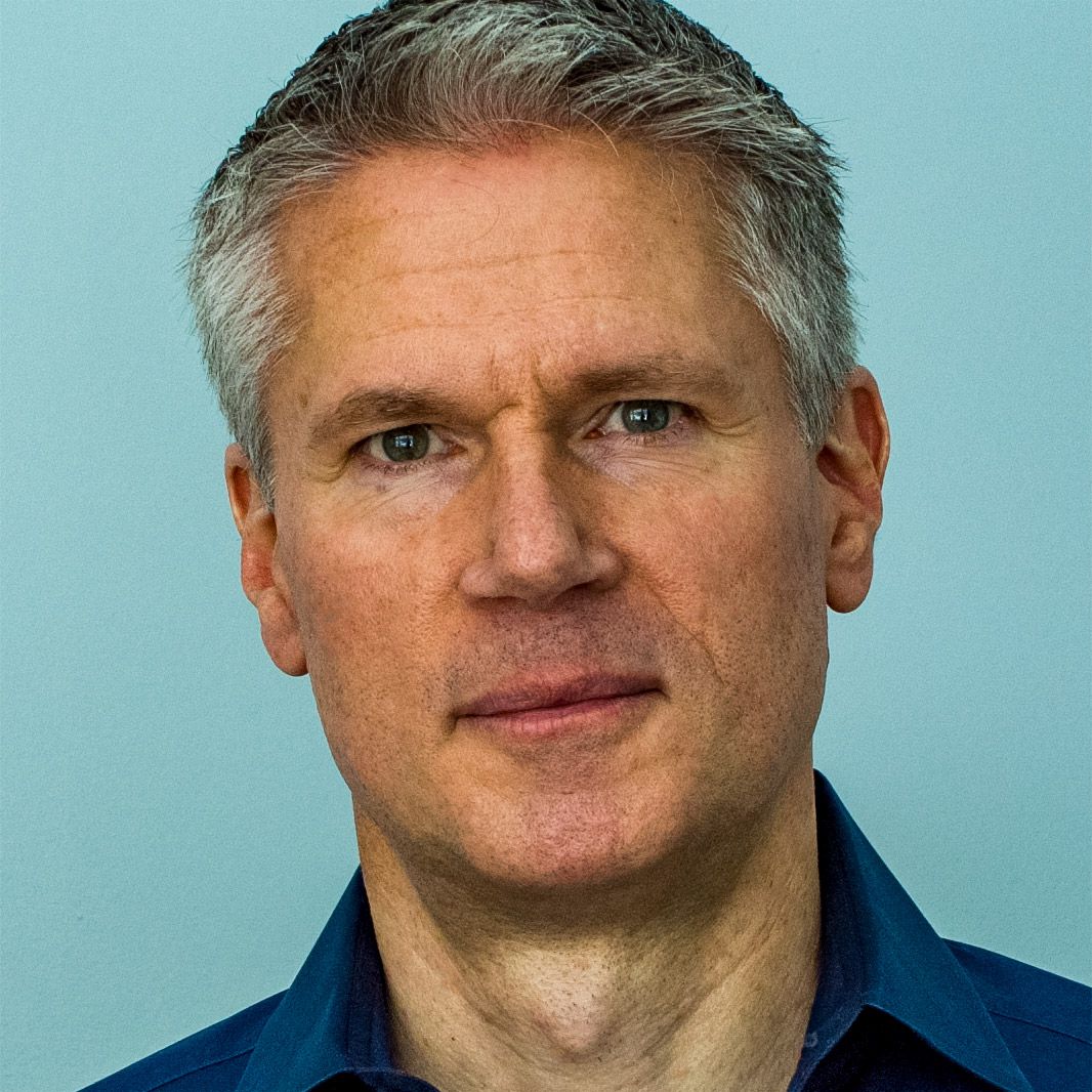 A white man with grey hair looks into the camera. It is Peter Tamte circa 2021.