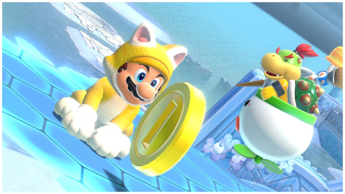 Mario indossa un costume da gatto mentre Bowser Jr. guarda con desiderio il suo nemico. Una bellissima moneta d'oro aleggia in primo piano, ignorata dal duo, in Super Mario 3D World + Bowser's Fury