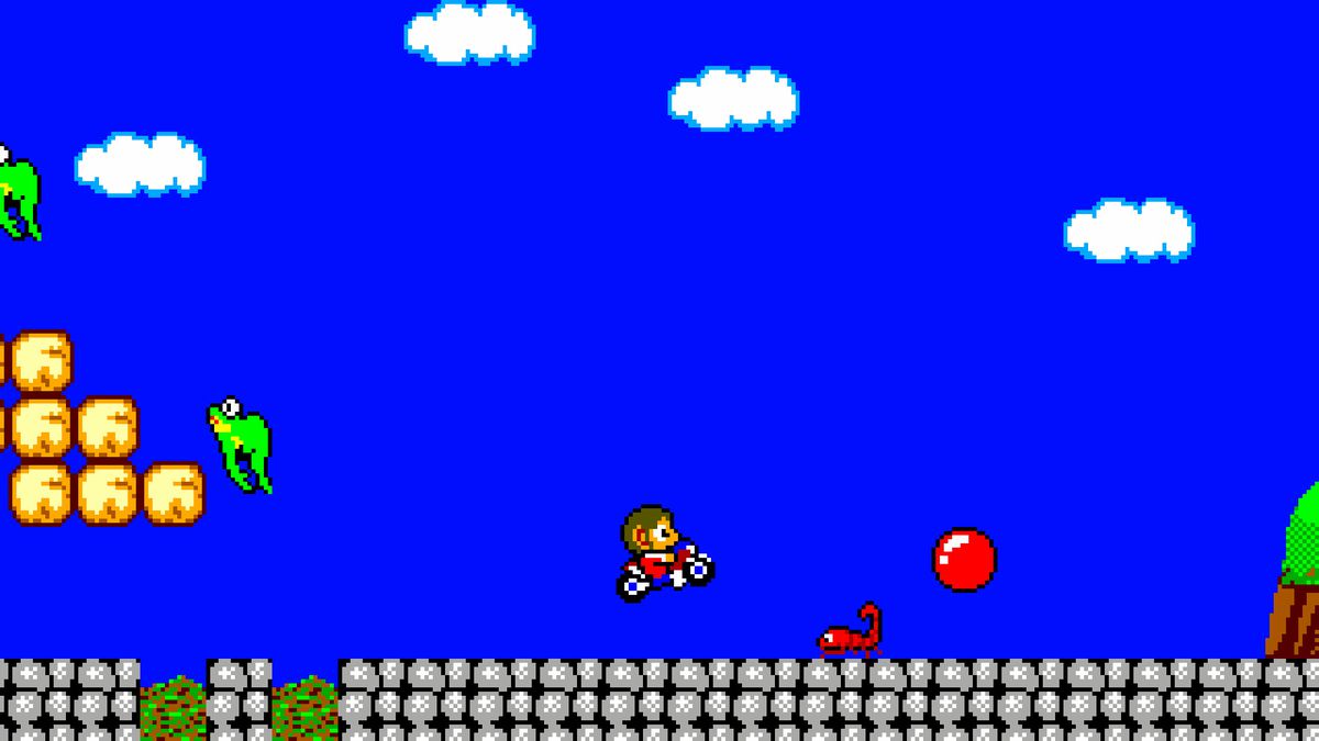 Alex Kidd nella modalità grafica classica di Miracle World DX con Alex sulla sua moto