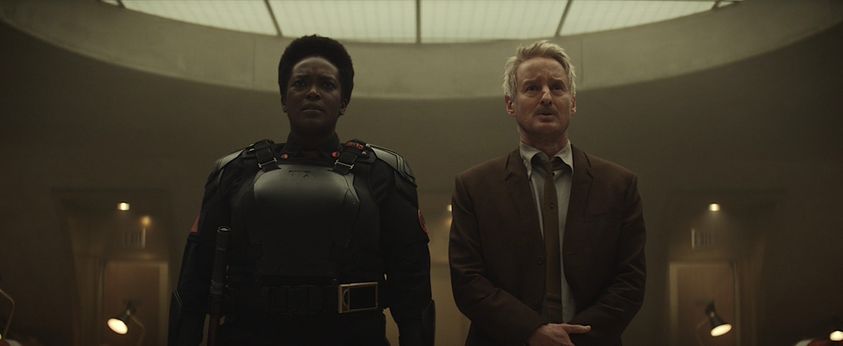 Hunter B-15 and Mobius stare at what the Lokis have wrought at the end of the season finale of Loki