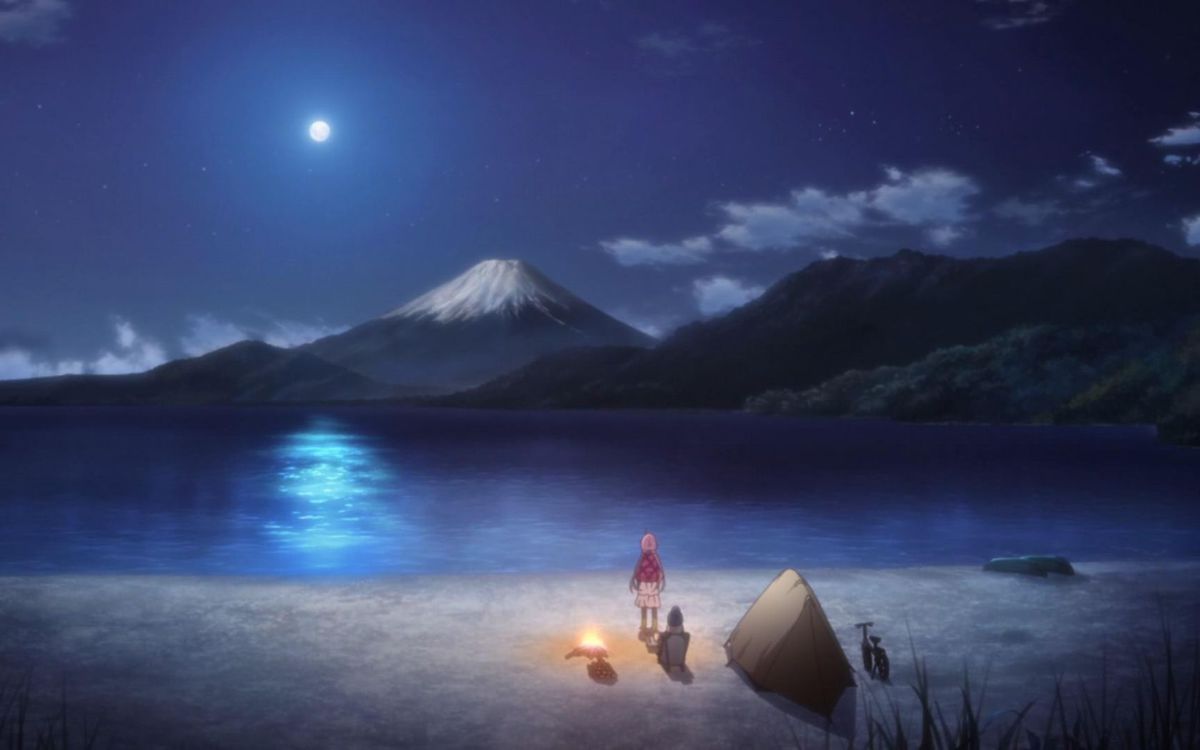 Nadeshiko Kagamihara e Rin Shima ammirano la vista del Monte Fuji di notte nel Laid-Back Camp