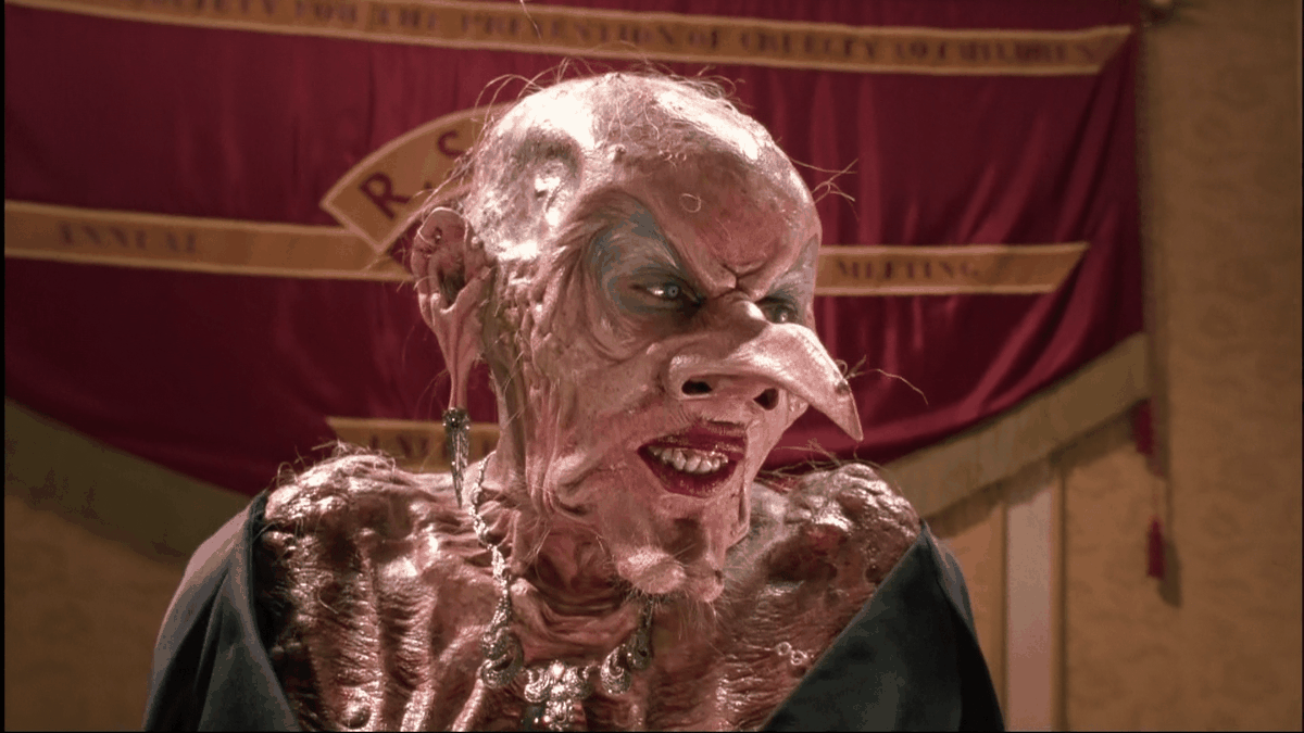 Anjelica Houston as a hideous, bald, huge-nosed witch in The Witches