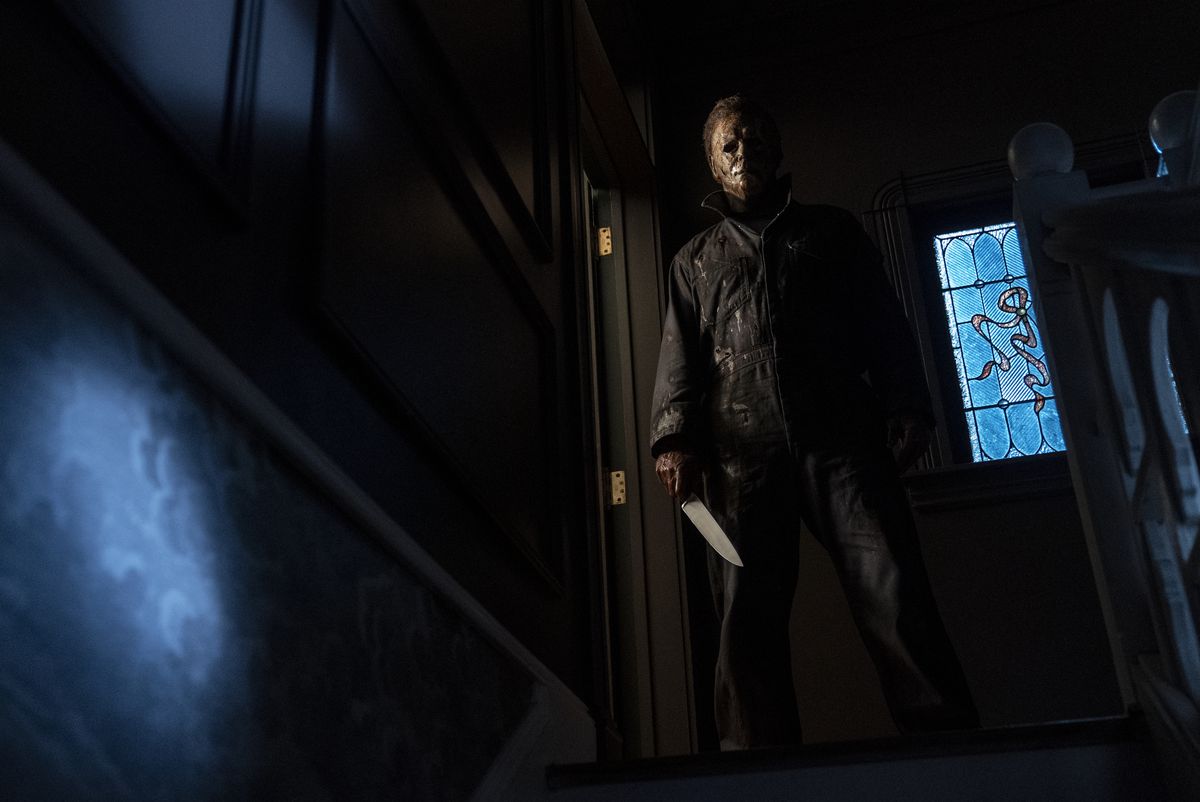 Halloween Kills: Michael Myers stands at the top of the stairs