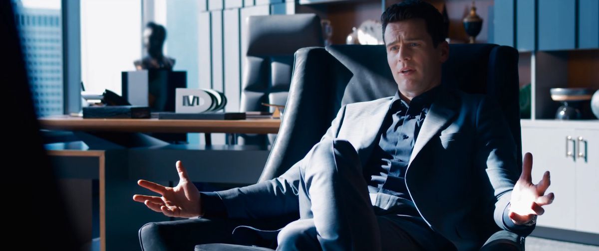 Jonathan Groff as some guy sitting in a nice office in The Matrix Revolutions