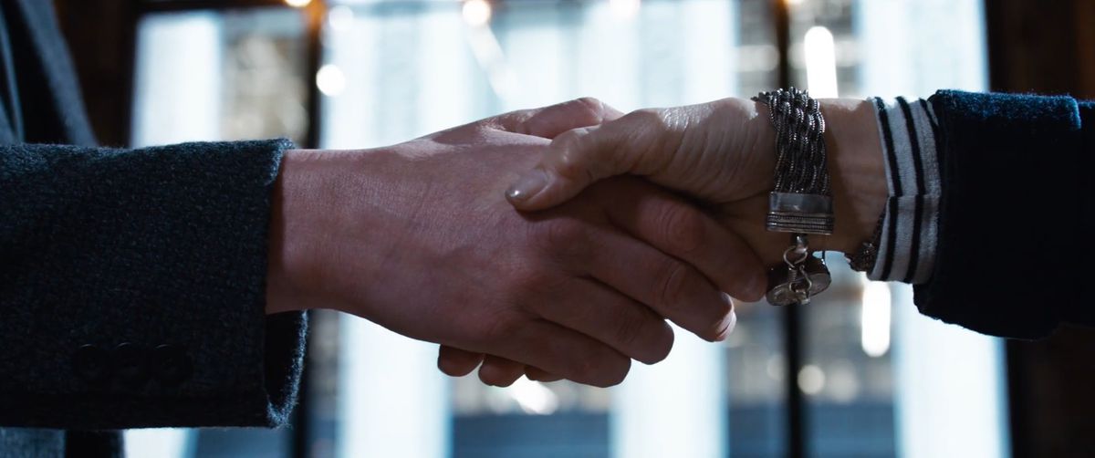 Neo and Trinity shake hands in The Matrix Resurrections