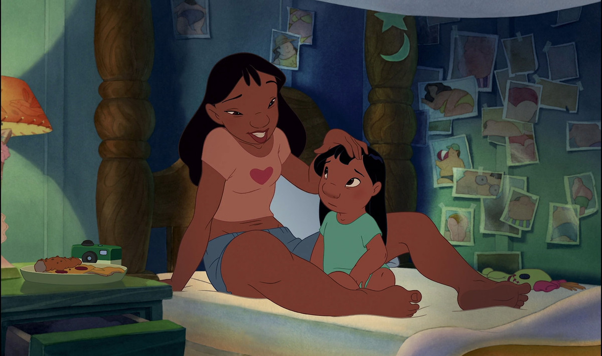 nani and lilo sitting on a bed, bonding