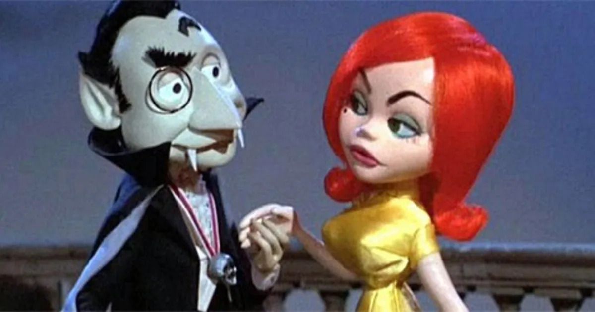 Dracula holding Francesca’s hand in Mad Monster Party