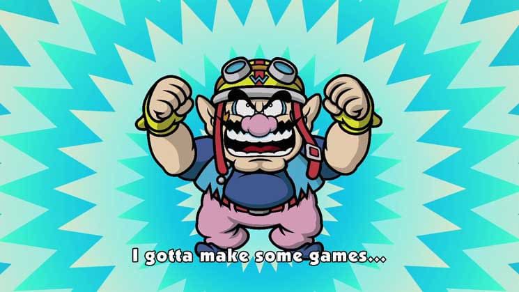 Wario sta con le mani in alto e dice