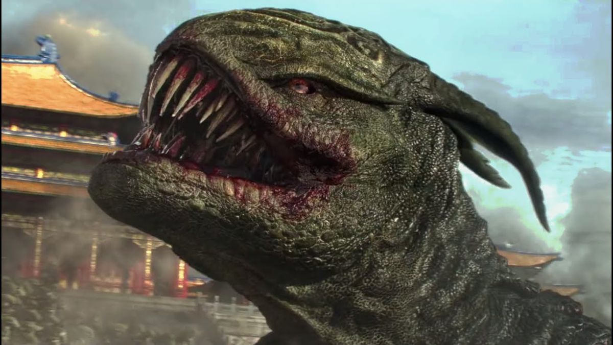 Mostro verde che sbarra i suoi denti inzuppati di sangue