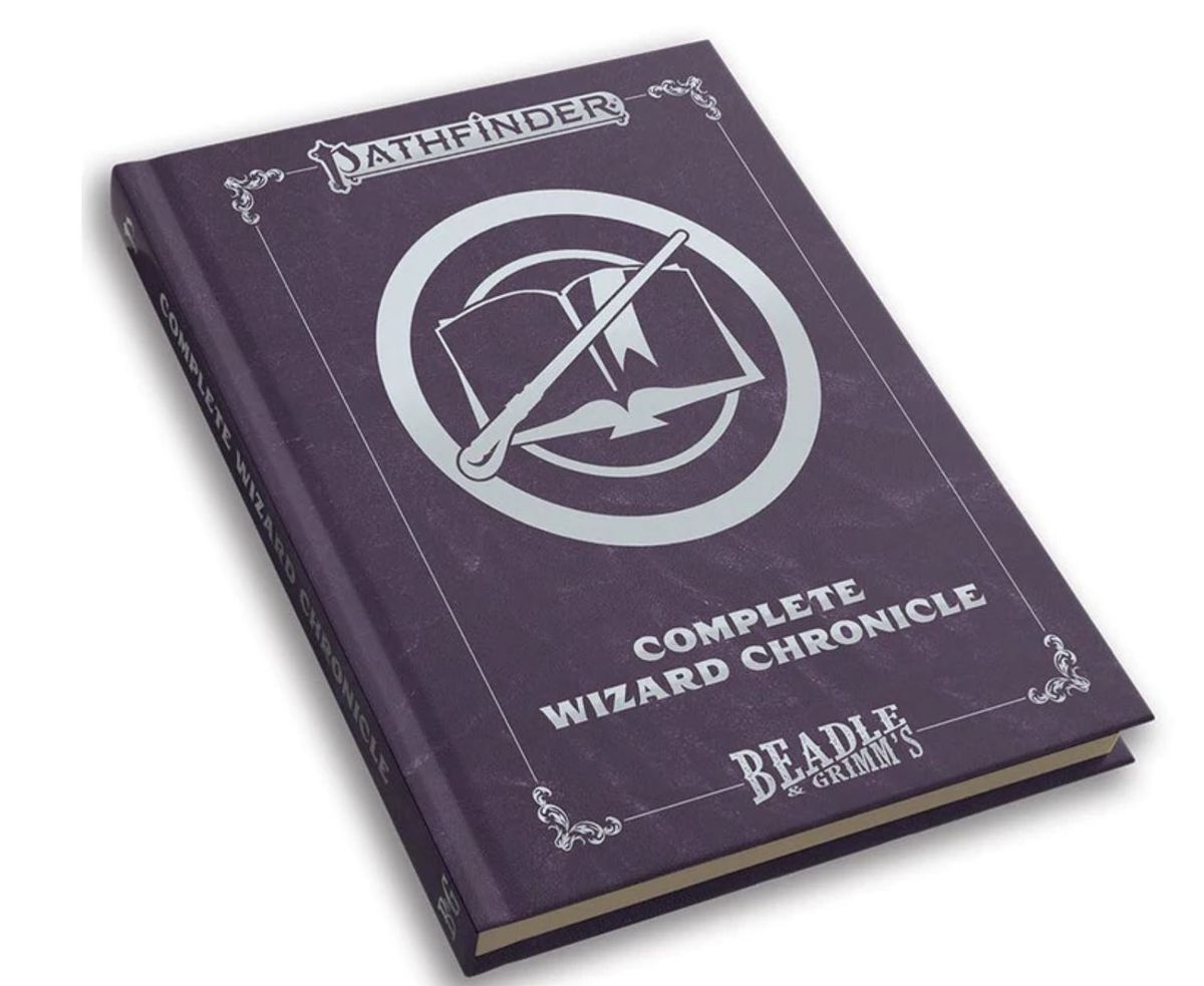 Un libro viola con una bacchetta sul davanti.