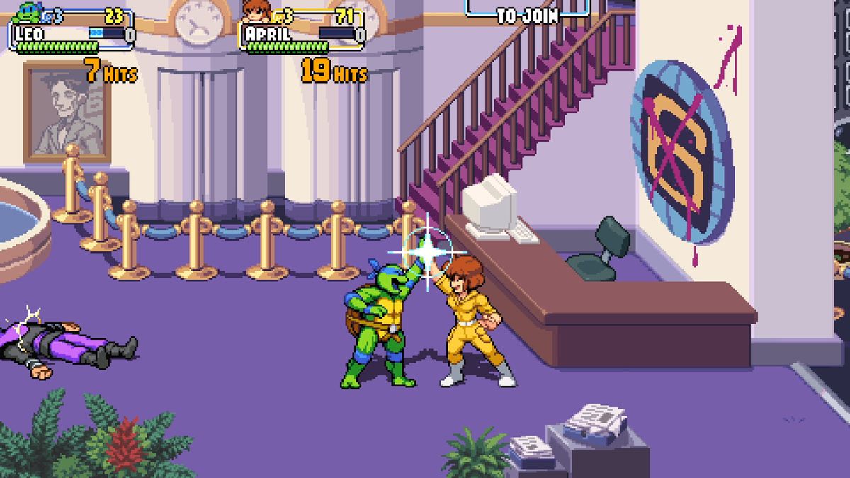 Leonardo e April O'Neil danno il cinque in uno screenshot di Teenage Mutant Ninja Turtles: Shredder's Revenge