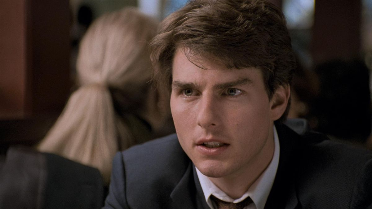 Un giovane Tom Cruise indossa un abito in The Firm.