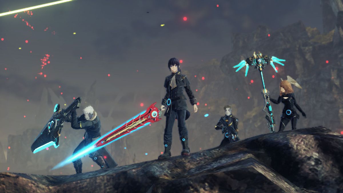 Il cast di Xenoblade Chronicles 3 in piedi in un'area vulcanica