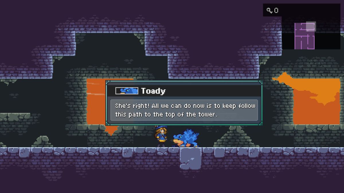 Un personaggio femminile in abito blu è in piedi accanto a un grande rospo blu chiamato