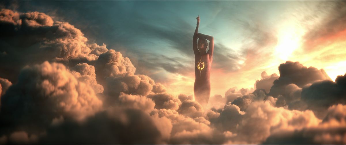 Un'inquadratura del regno del Desiderio, un edificio a forma di Desiderio con un cuore esposto, in piedi sopra le nuvole