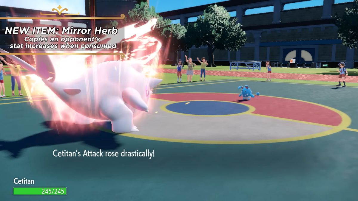 L'oggetto tenuto da Cetitan, Specchio d'erba, viene attivato, aumentando l'attacco di Cetitan. Il testo dell'immagine recita: