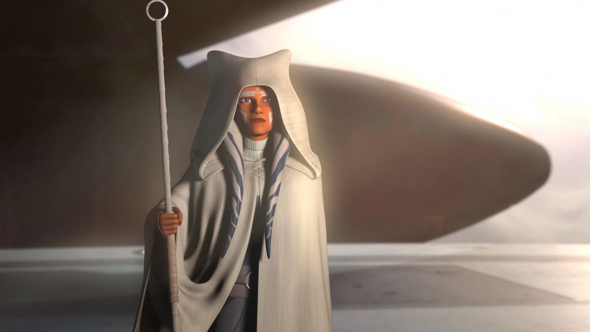 Ahsoka Tano con una tunica bianca, con in mano un bastone bianco, in Star Wars Rebels