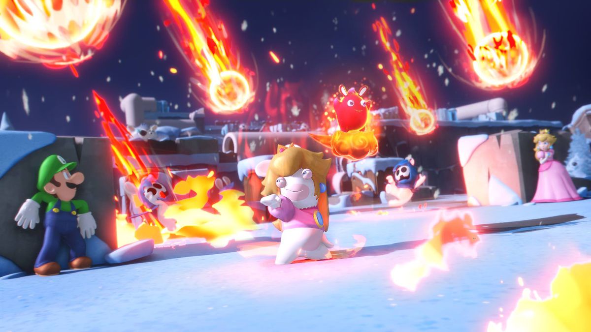 Rabbid Peach si trova di fronte a Luigi mentre palle di fuoco piovono dal cielo in Mario + Rabbids Sparks of Hope.