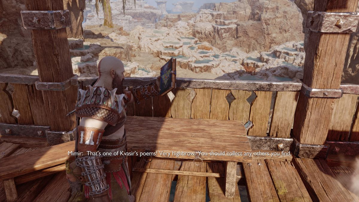 Kratos prende un libro in God of War Ragnarök