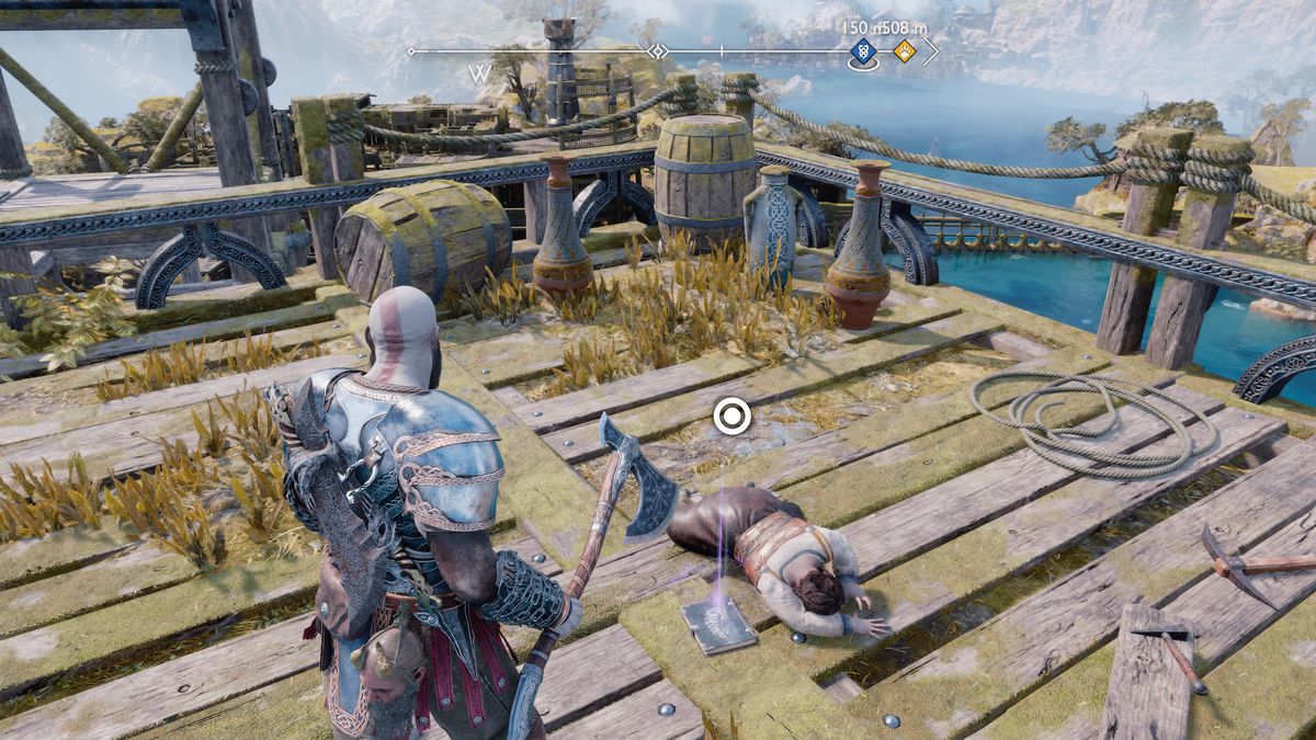 Kratos prende un libro in God of War Ragnarök