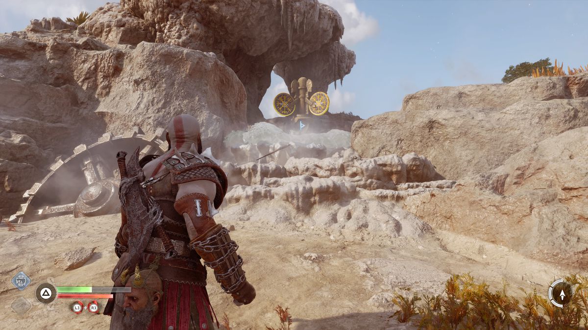 Kratos attiva un interruttore in God of War Ragnarök