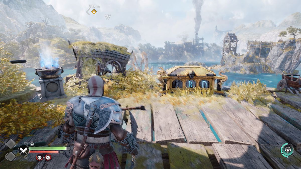 Kratos accende un braciere in God of War Ragnarök