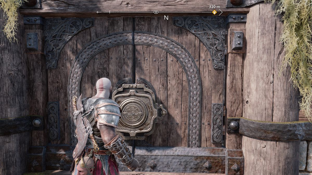 Kratos, Atreus e Mimir tentano di varcare la porta della Torre di Guardia in God of War Ragnarok