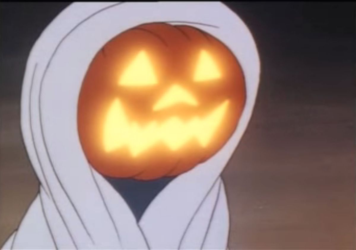 Una testa di jack o lantern si nasconde sotto una coperta bianca in Canto di Natale di Brer Rabbit (1992)