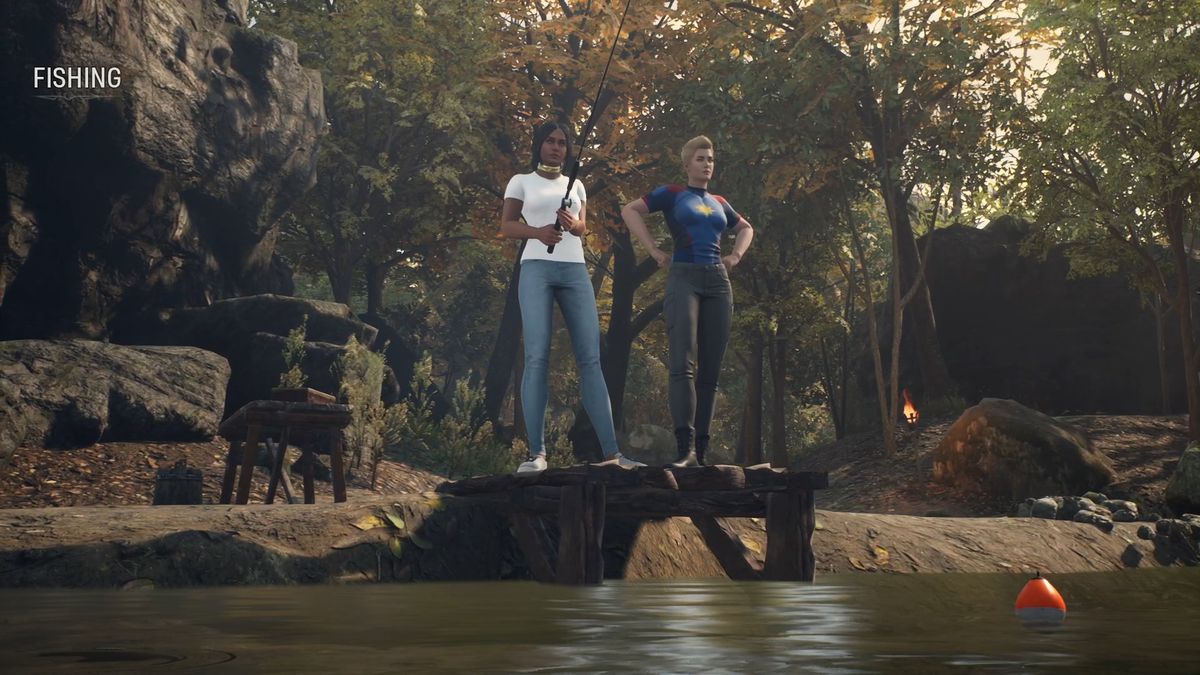 Il cacciatore e Captain Marvel pescano nel ruscello nel bosco.