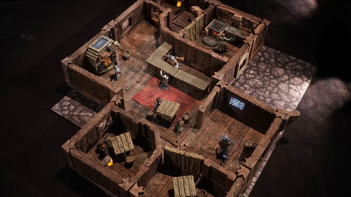 Una vista a volo d'uccello di uno spazio interno creato utilizzando il terreno Dwarven Forge.