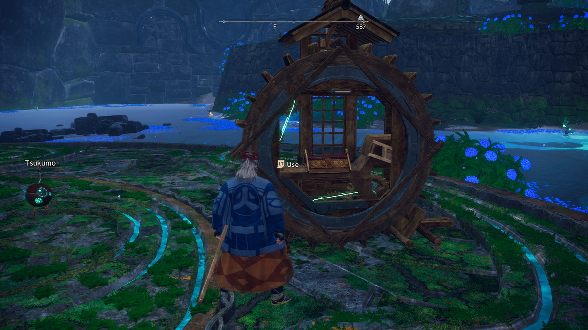 Un cacciatore di Wild Hearts in piedi davanti a una motocicletta Roller monowheel.