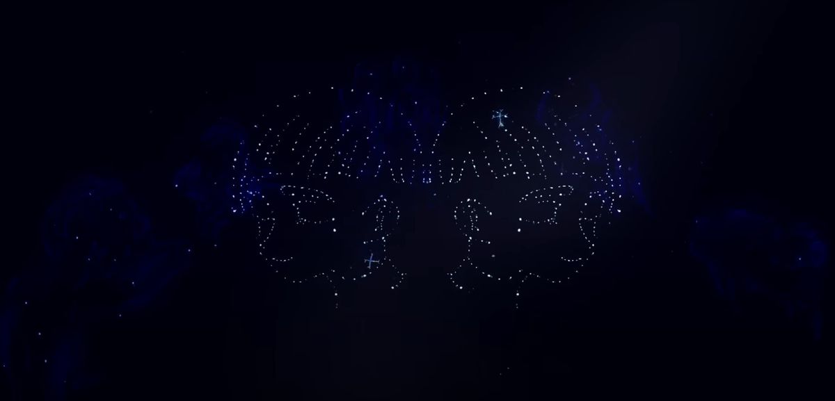 Una scena animata di stelle disposte per assomigliare a due ragazzi anime sorridenti dai capelli corti che si fissano l'uno di fronte all'altro.