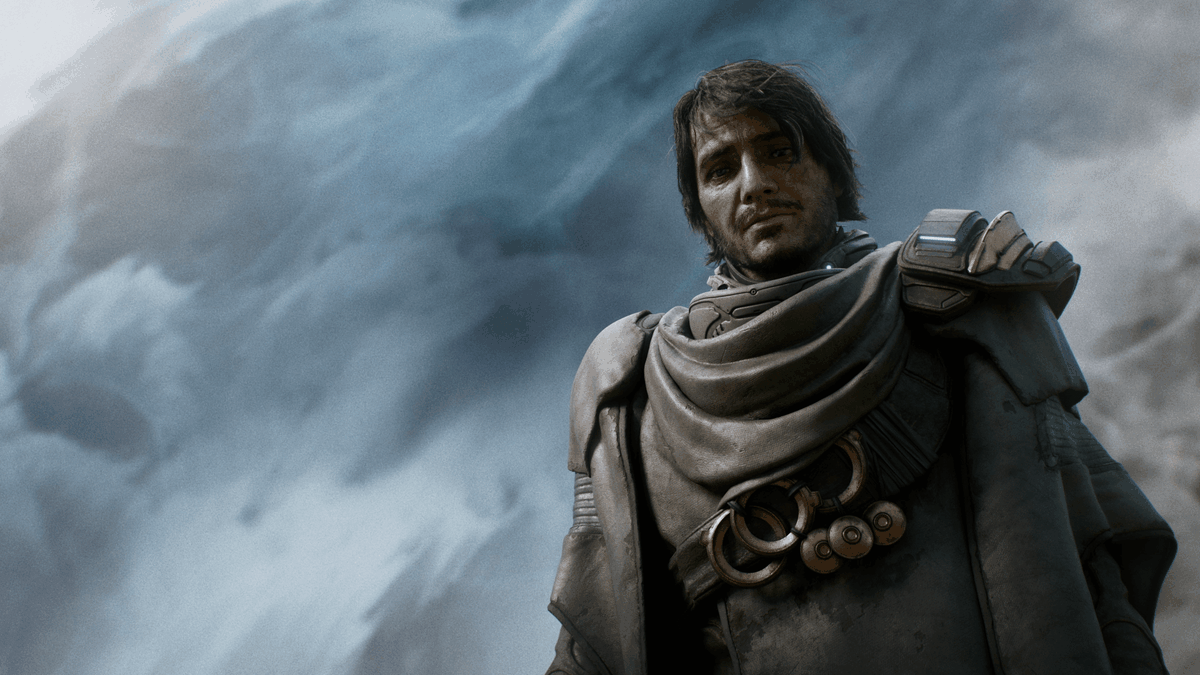 Il Ramingo, un uomo dall'aspetto stanco in abiti fantascientifici futuristici, con pesanti fibbie e strati drappeggiati intorno al collo. Sembra di mezza età, esausto e sfinito.