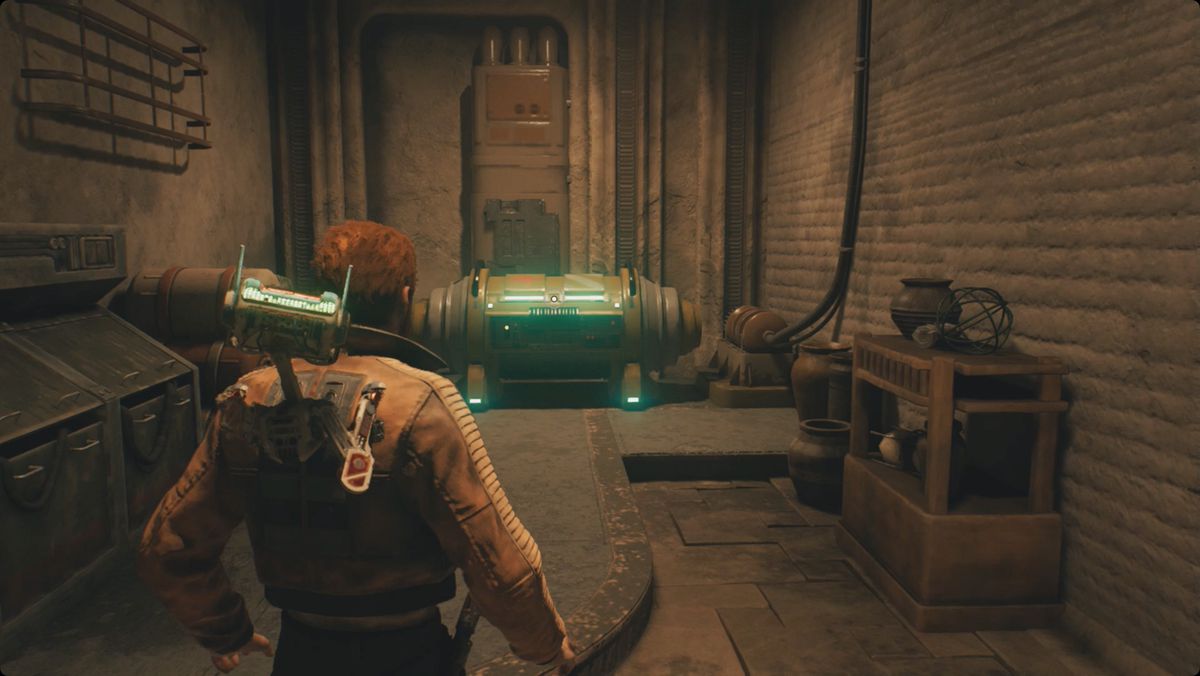 Star Wars Jedi: Survivor Cal e BD si avvicinano alla cassa nel magazzino del negozio di Doma.