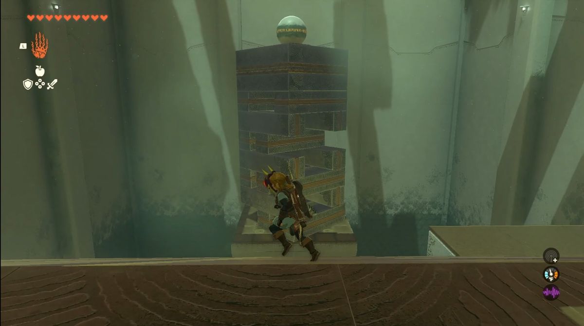 Una torre di lunghe travi metalliche si trova di fronte a Link, con una palla in equilibrio in cima.  Nel Santuario Jochi-iu di Zelda: Tears of the Kingdom