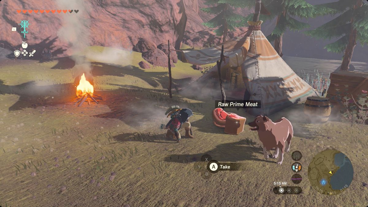 The Legend of Zelda: Tears of the Kingdom Link dà da mangiare a un cane in un campeggio vicino alla grotta del lago Cephla