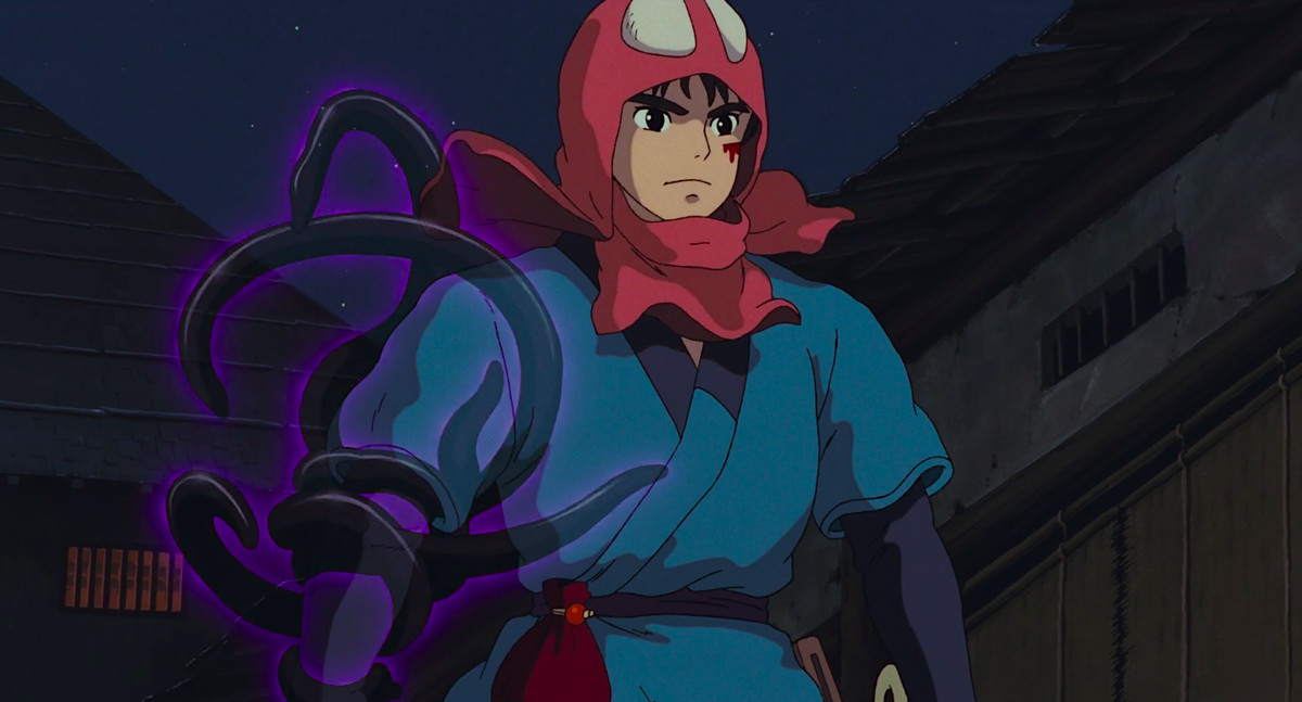 Il guerriero Ashitaka avanza, il braccio destro che si contorce con i tentacoli viola semitrasparenti della sua maledizione spirituale, in Princess Mononoke