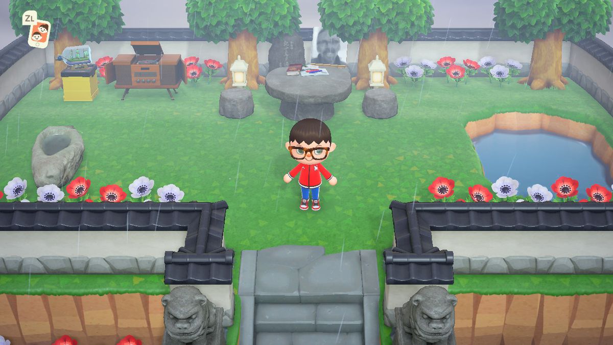 L'avatar di Animal Crossing di Joshua Booth in piedi in un giardino commemorativo fatto per suo padre