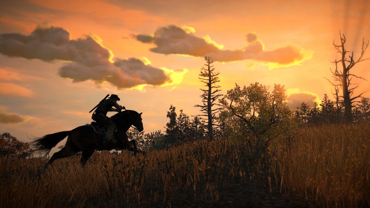 Red Dead Redemption - John Marston a cavallo attraverso l'erba al tramonto