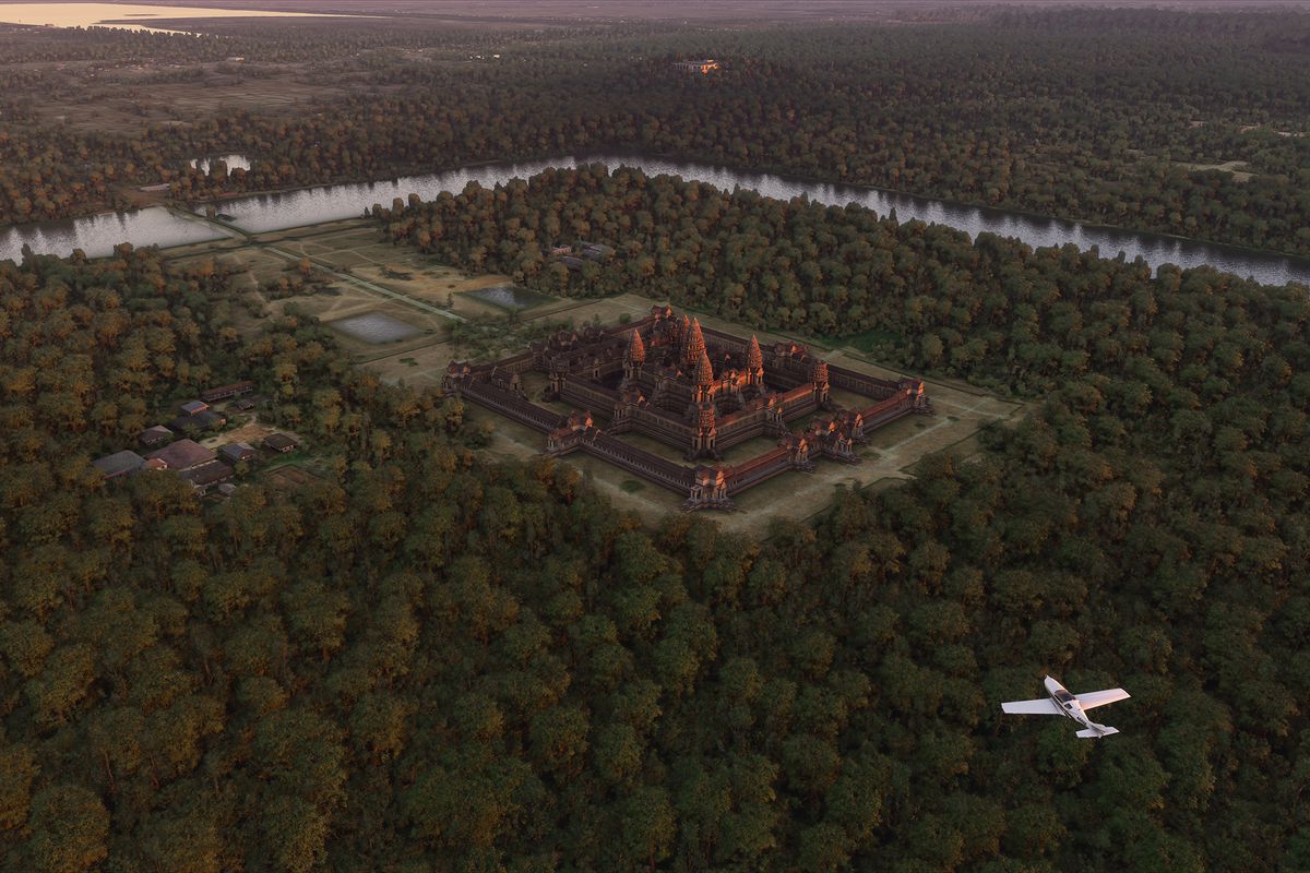 un aereo bianco sorvola Angkor Wat in Cambogia in Microsoft Flight Simulator