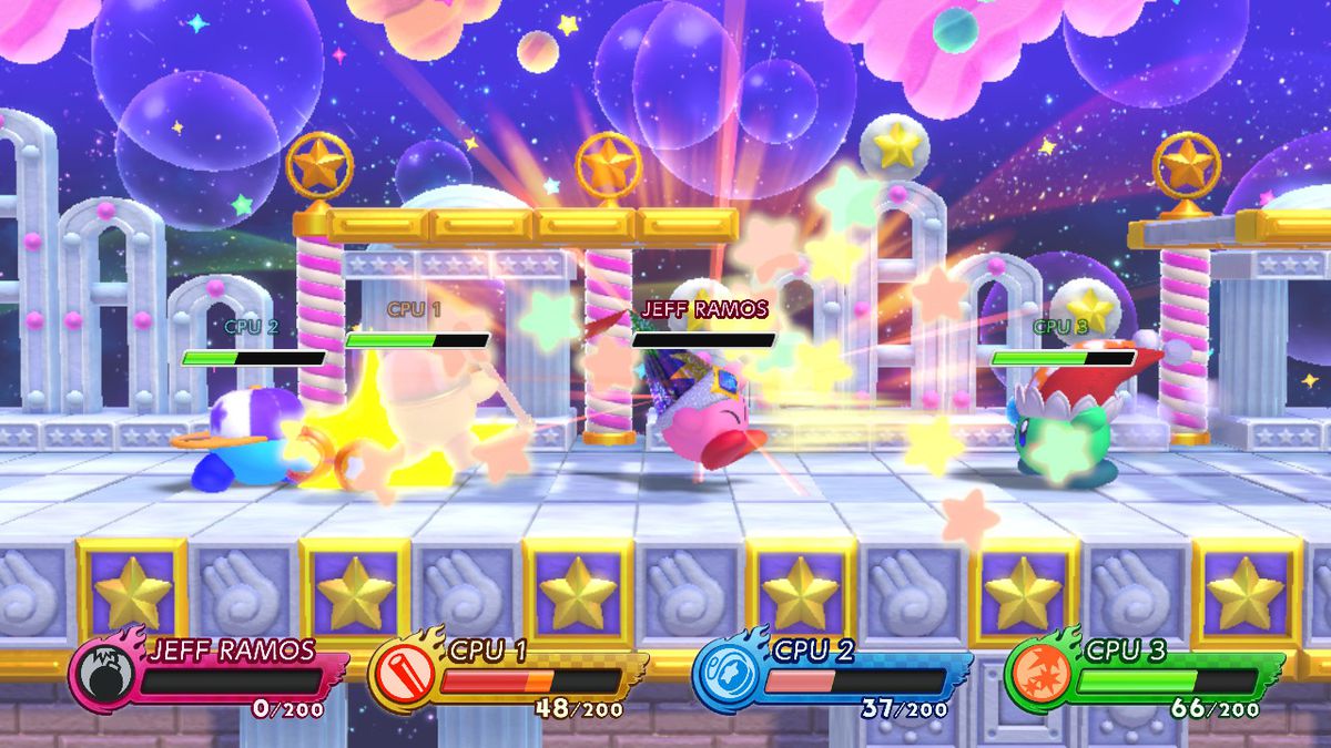 Quattro Kirby stanno combattendo in Kirby Fighters 2